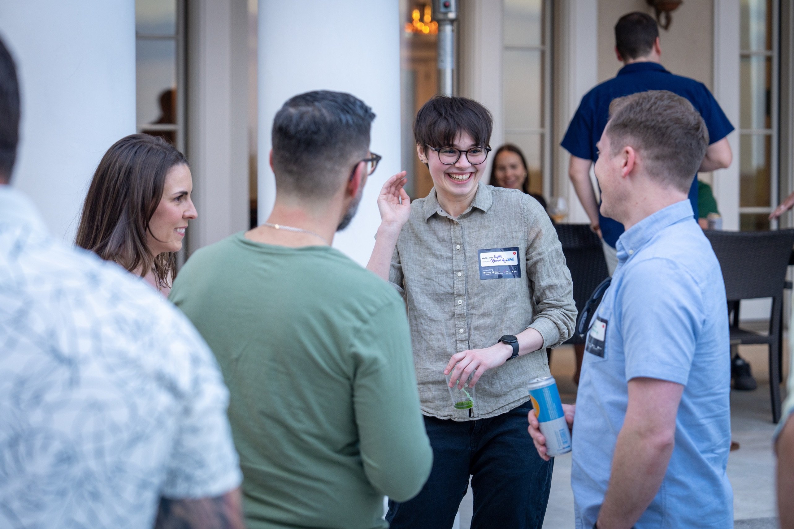 Guests laughing and chatting