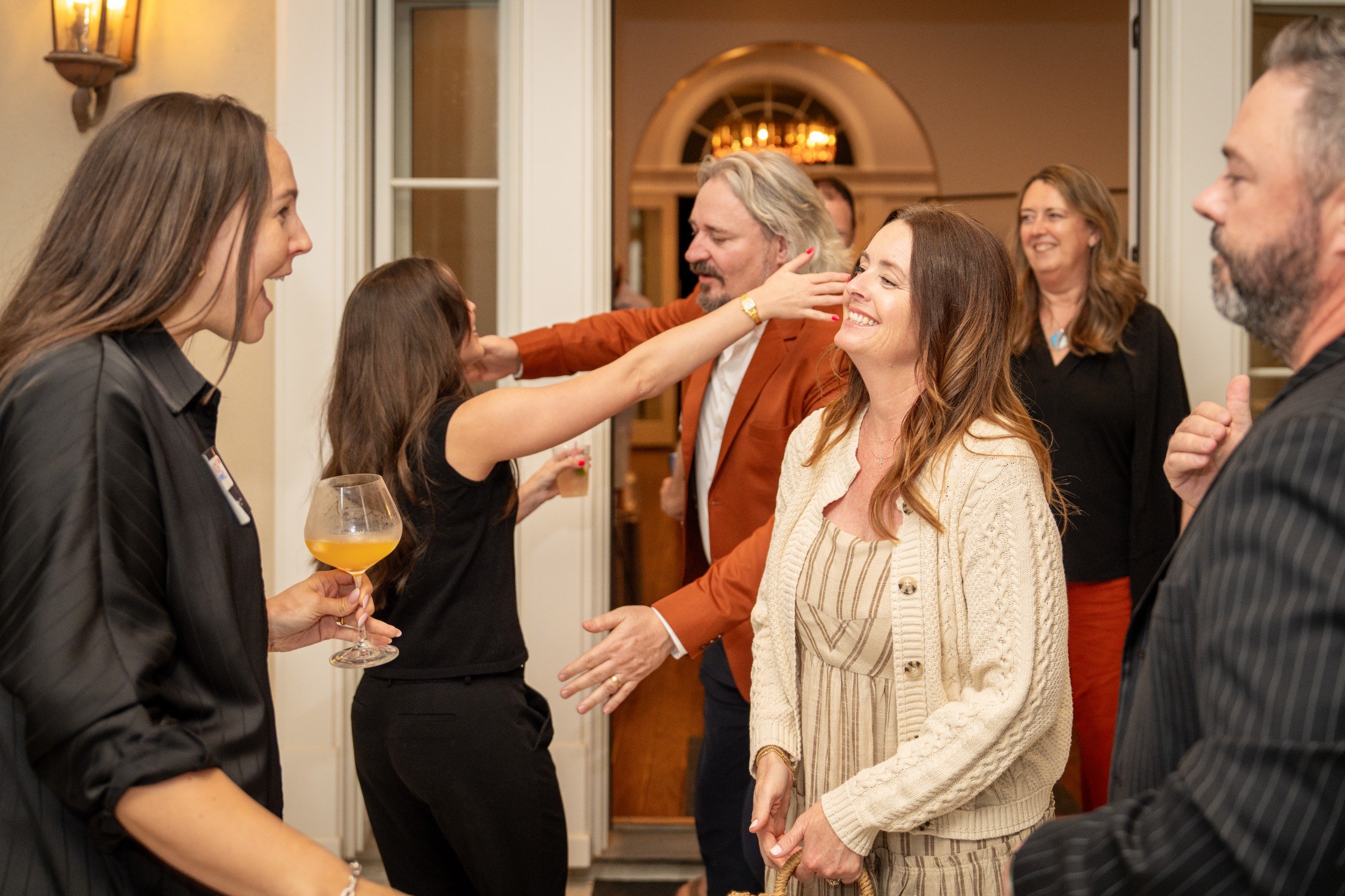 Guests greeting each other.