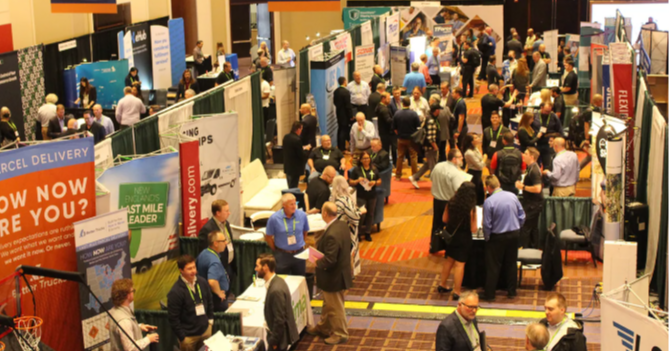Attendees networking with parcel shipping and logistics vendors on the PARCEL Forum exhibition floor.