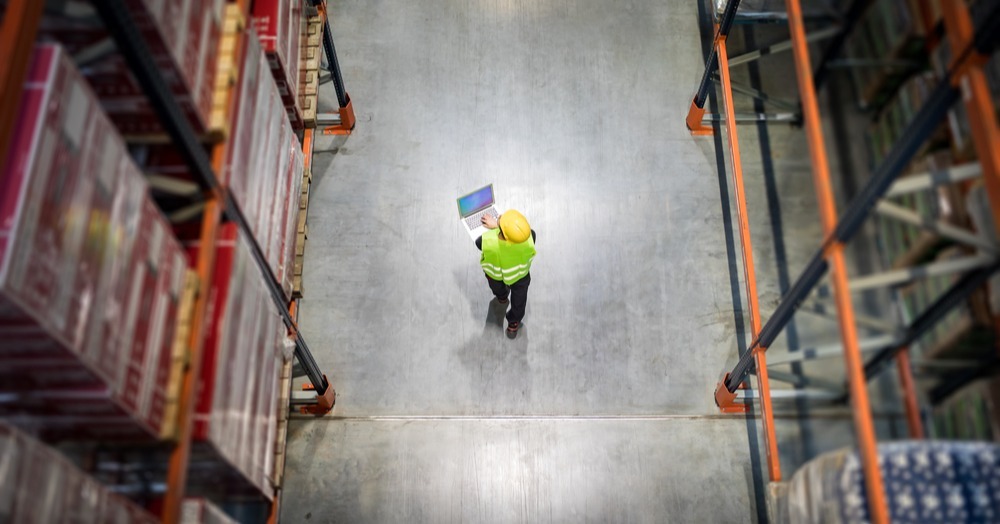 checking-warehouse-database-of-inventory-with-lapt-2024-10-30-22-20-51-utc-1-1