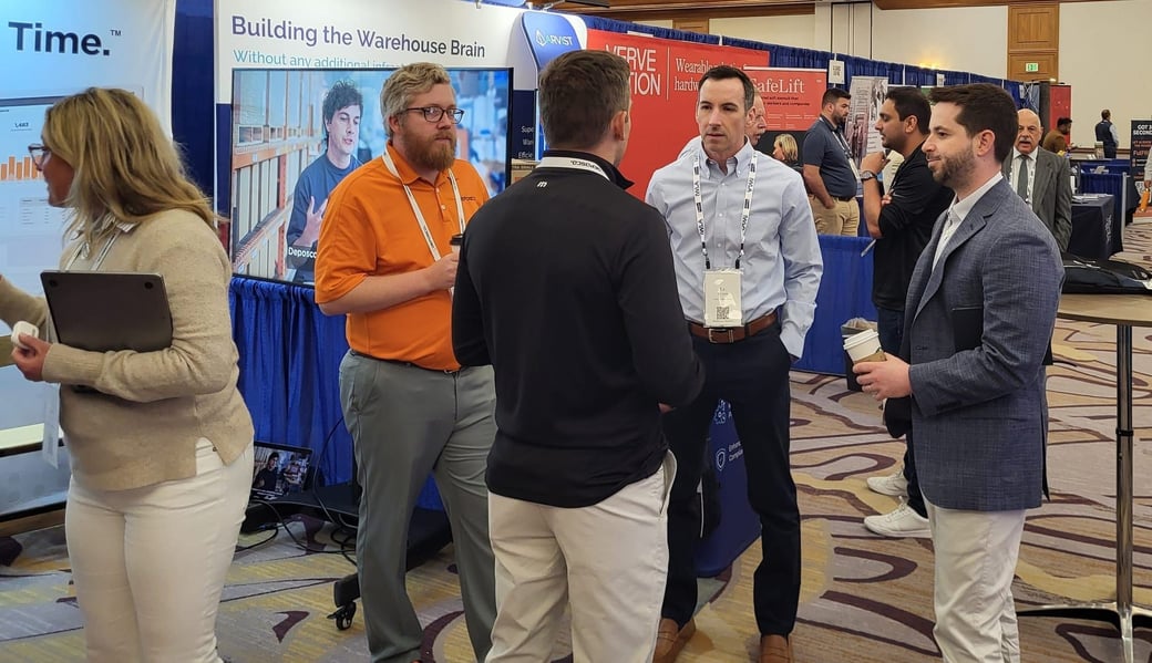 Attendees chatting at a previous IWLA convention edition