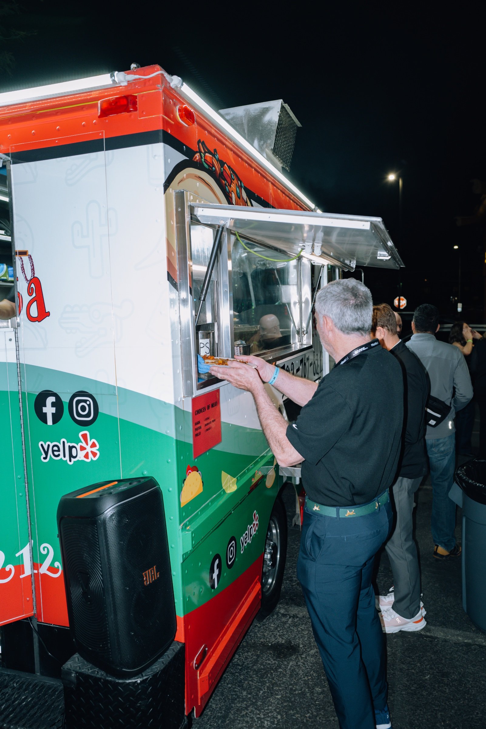People eating at the foodtruck area
