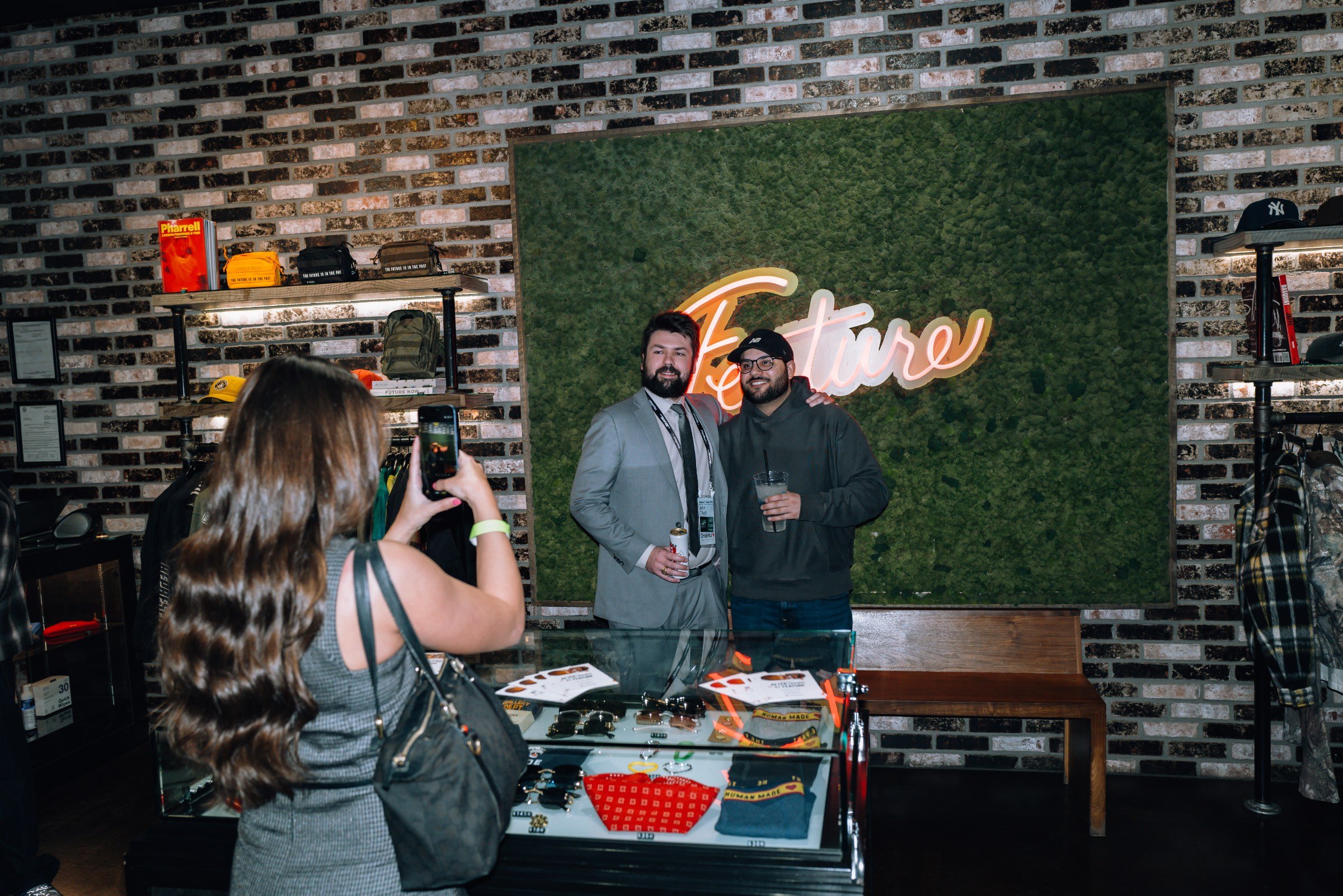 People posing for pictures at the off-site party