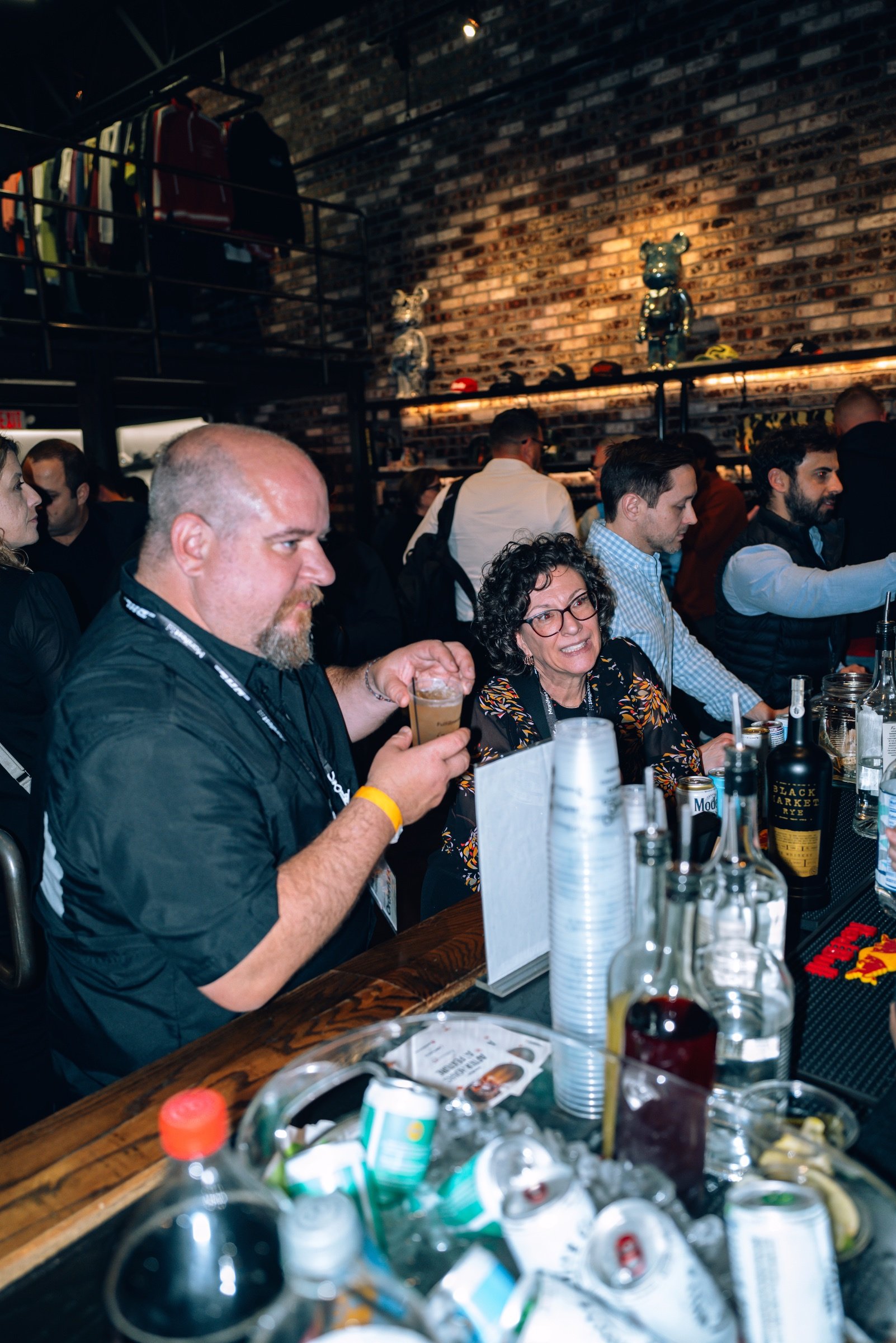 People at the open bar at the party