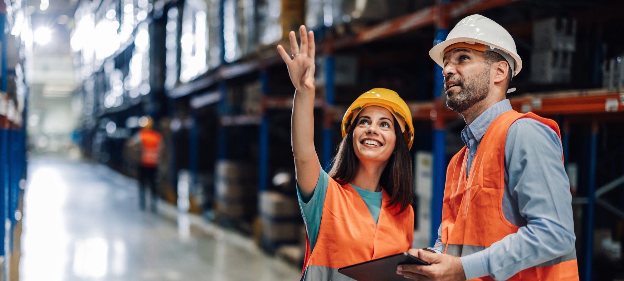 warehouse-workers-discussing-logistics-and-pointin-2025-04-03-20-04-07-utc